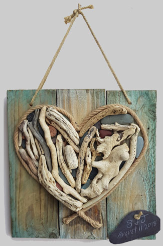 Artwork created from driftwood & pebbles, original works of art in acrylics & oil pastel, hand painted T-shirts inspired by & made in the beautiful Llyn Peninsula, North Wales 